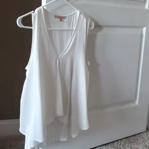 Ladies white sleeveless blouse